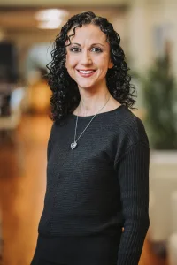 A professionally shot portrait of Lena Dunn, an APRN at Community Health Northwest Florida.
