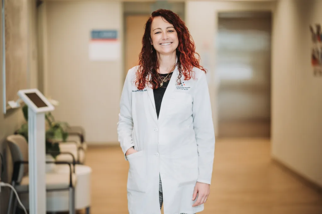 A portrait of Nicole Manhute with Community Health Northwest Florida.