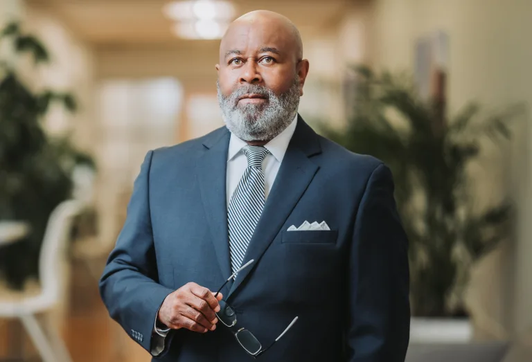 A professionally shot portrait of Reginald Dogan.