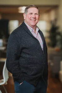 A professionally shot portrait of Walter Arrington, Director of Grants and Development at Community Health Northwest Florida.