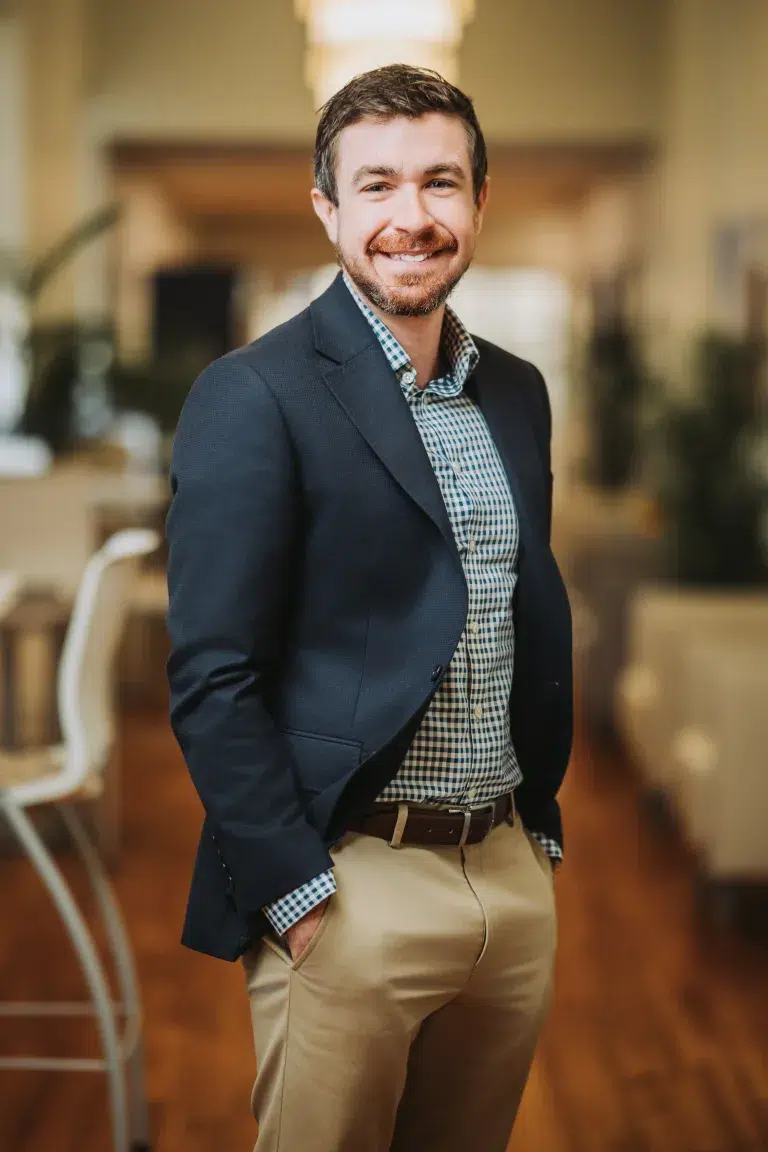 A professionally shot portrait of Josh Newby of the Community Health Northwest Florida Foundation board.